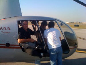 Carl tries to figure out how to shoot a full-size camera in a mini-chopper.