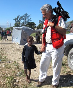 iCarl's friend attached herself to his pinky while he was covering a Red Cross distribution of household supplies.